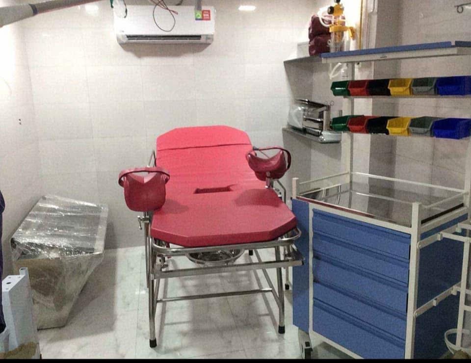 Gynaecology examination room with exam chair